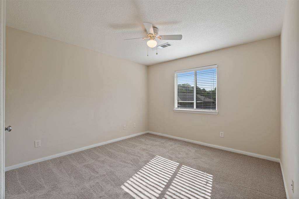Additional bedrooms are well-sized, offering flexibility for family, guests, or a home office.