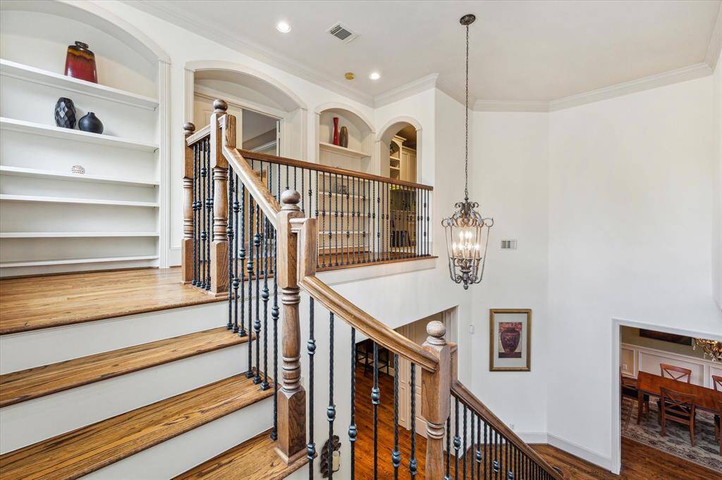 Elegant arches frame the doorways throughout the home, adding a touch of sophistication and architectural charm.