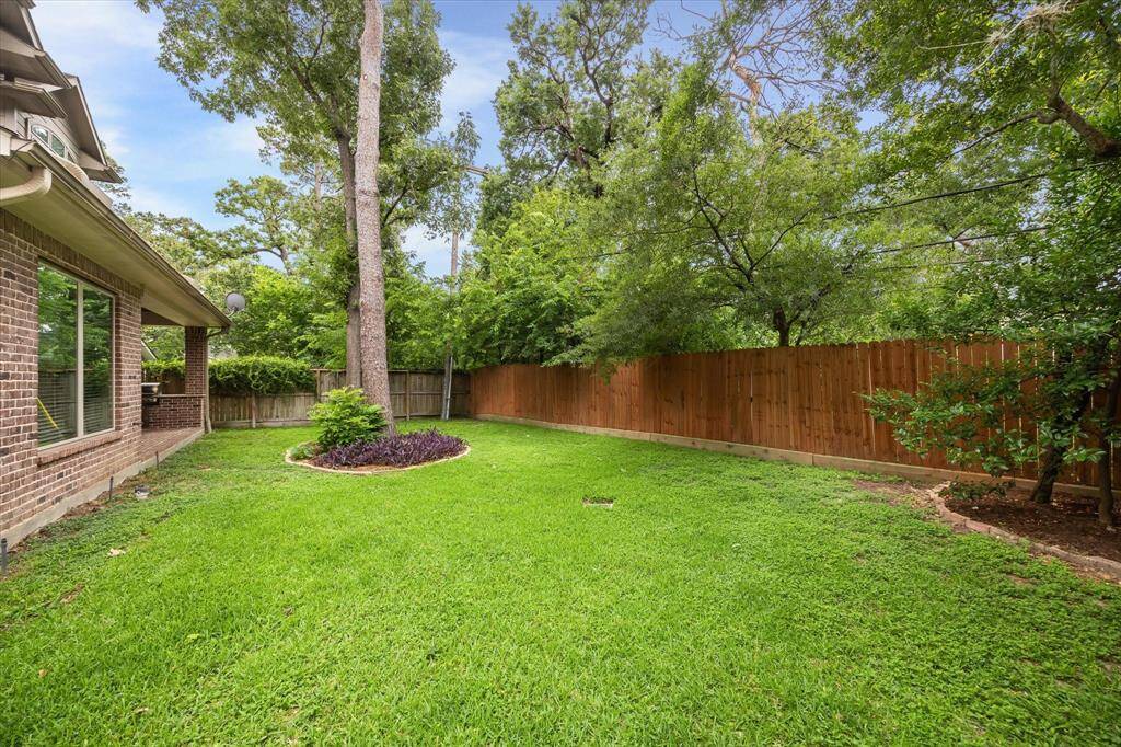 The spacious backyard offers plenty of room for a pool! The neighborhood features tennis/pickleball courts and a pool.