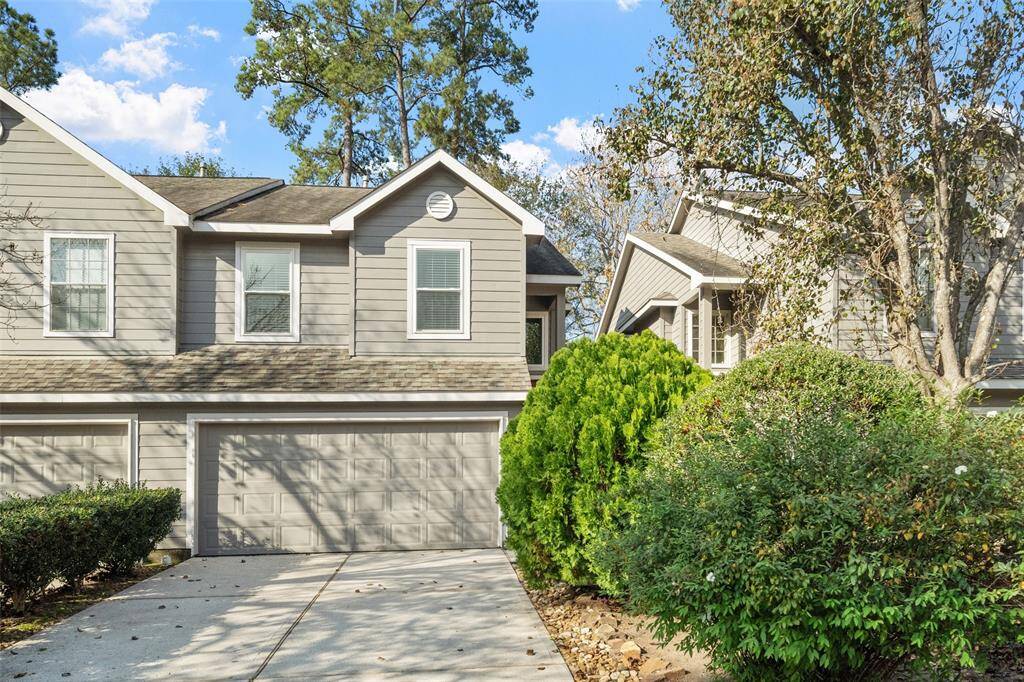 The property features low-maintenance landscaping, designed for both beauty and convenience, allowing you to enjoy a well-kept yard without the hassle.