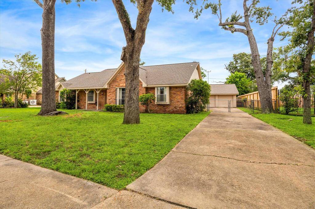 Terrific curb appeal located in a cul-du-sac. Long gated driveway with detached 2-car garage.
