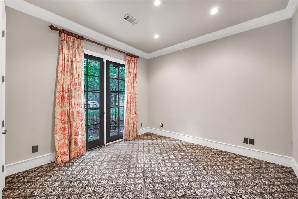 1- bedroom located down hallway. French doors face the front of the house. Generous size walk-in closet