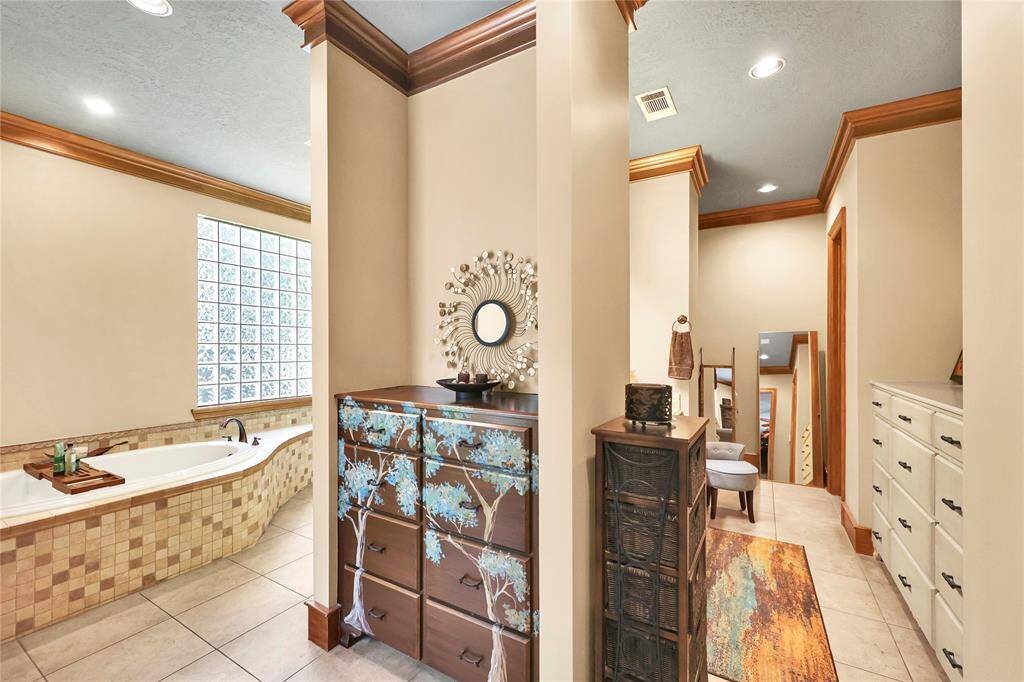 Primary suit bathroom is fit for a King and Queen.