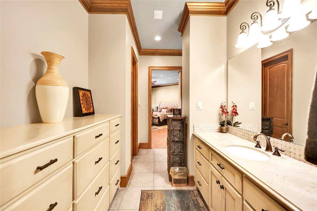 Not show, his and her closets with custom shelves, & drawers