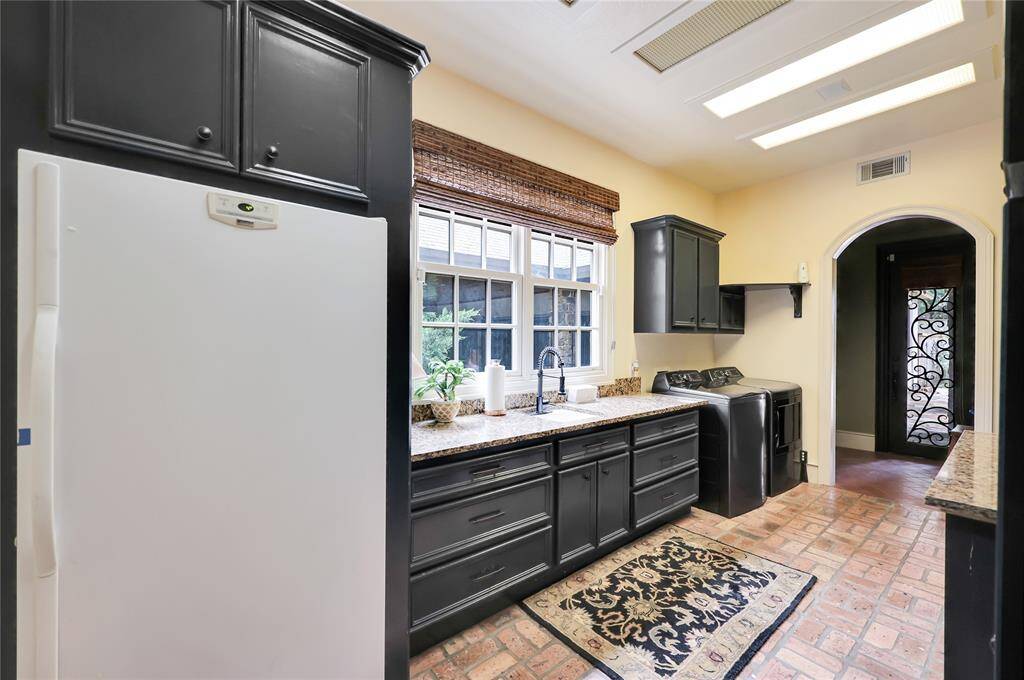 First floor Utility room located right off the kitchen