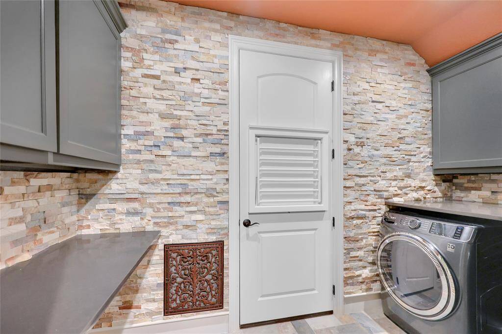 No need to bring your clothes downstairs to clean when you have a second floor laundry room.