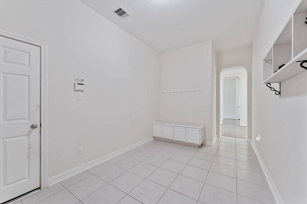 Mud room with storage as you entry from garage