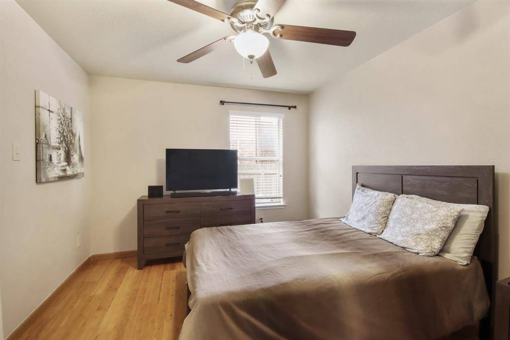 Cozy secondary bedroom with a walk-in closet.