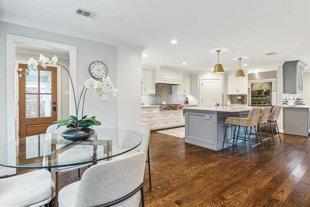 Gleaming hardwood floors throughout the entire first floor. Dining area connects beautifully to the kitchen.