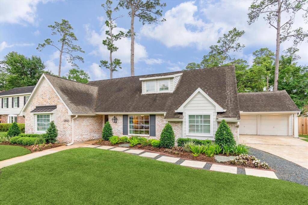 This lovely home sits on almost a 1/4 acre of land. Beautifully landscaped front and back yard.