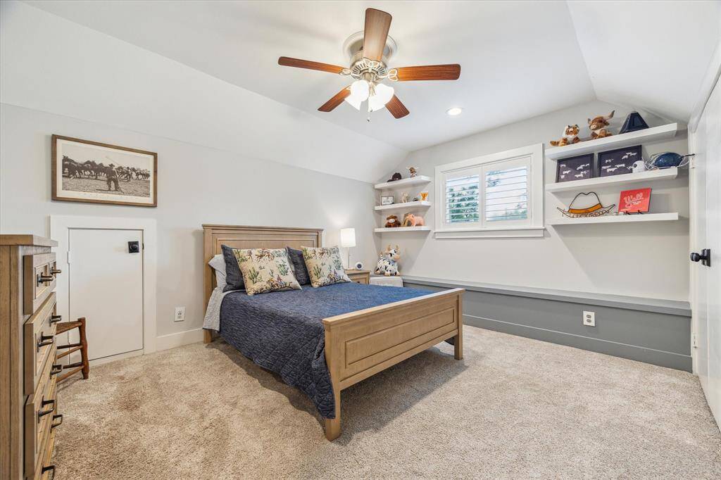 Spacious bedroom with built-ins and bench!