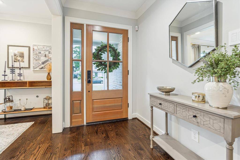 Beautiful entry door with sidelight window makes for a bright and cheery entrance!