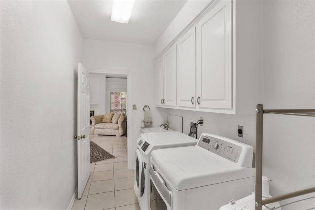 High ceilings, crown molding, tile floors and open to enjoy your family while they cook those great meals.