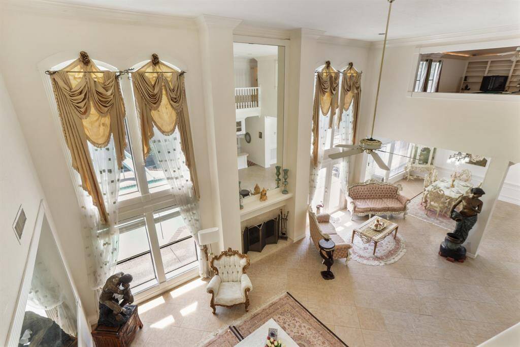 Landing upstairs with a great view of the foyer.