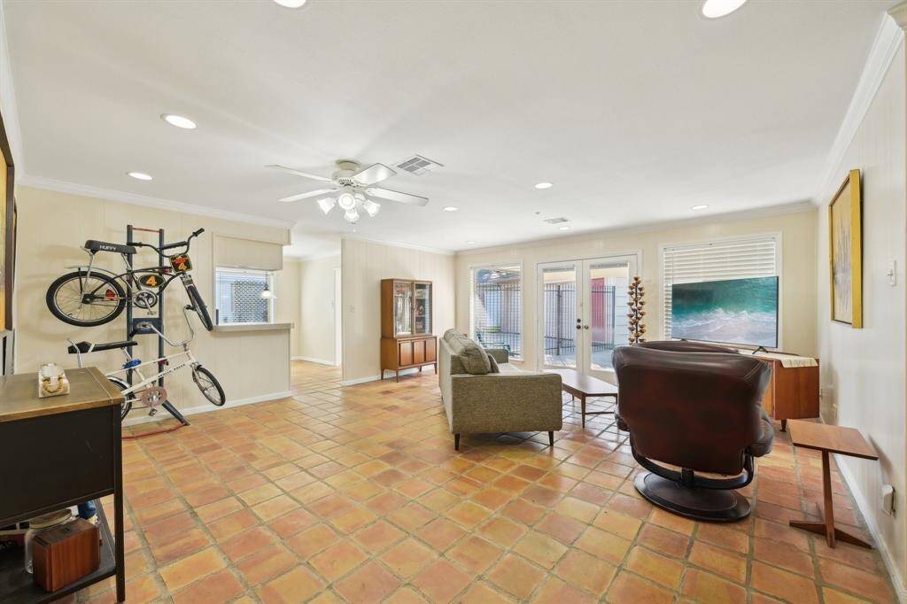 living area opens to covered porch!