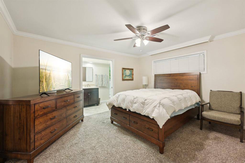Primary bedroom accommodates king size furniture