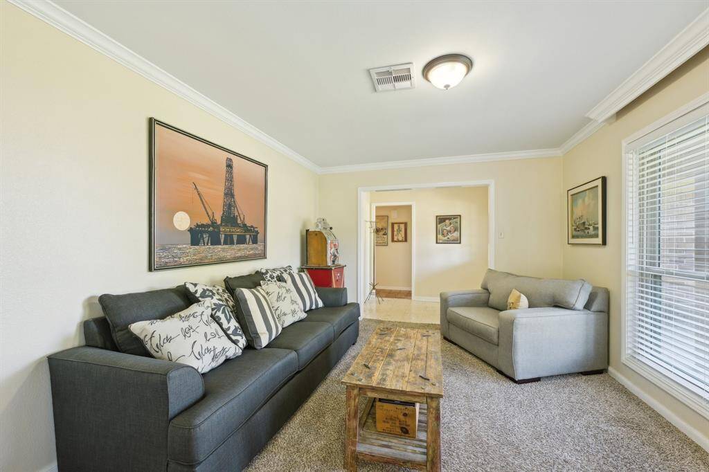 Front living room with HUGE windows!