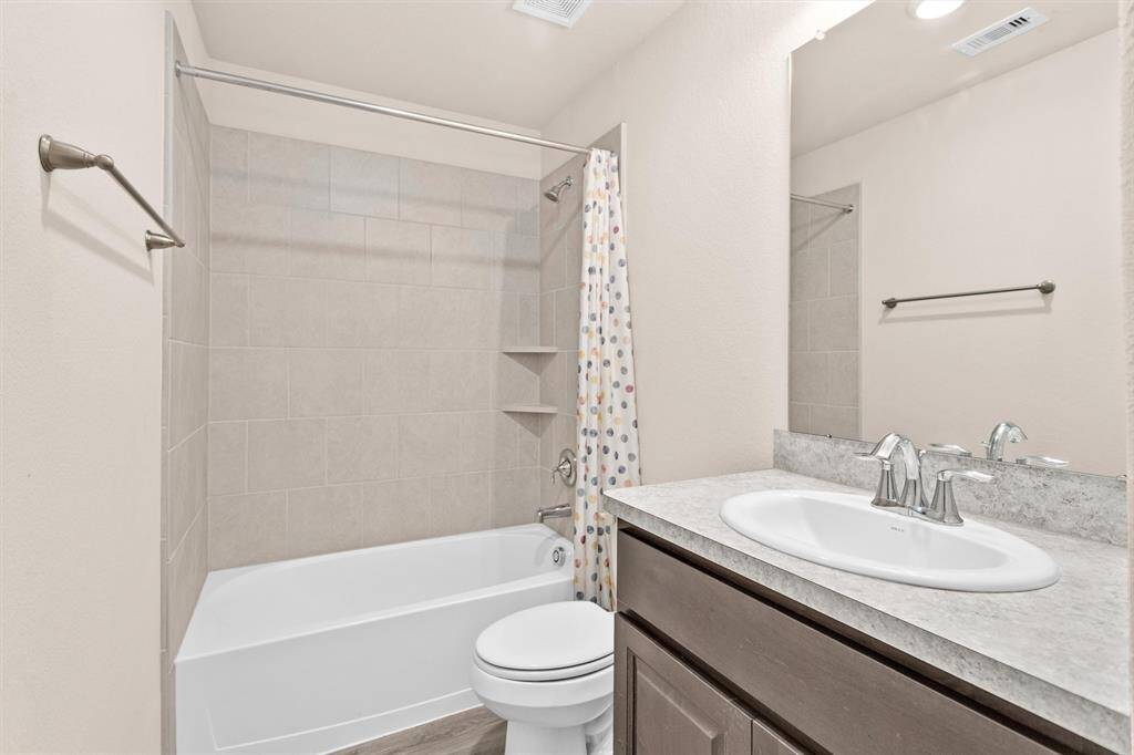 Full Bathroom #2 boasts modern finishes and a tub/shower combination.