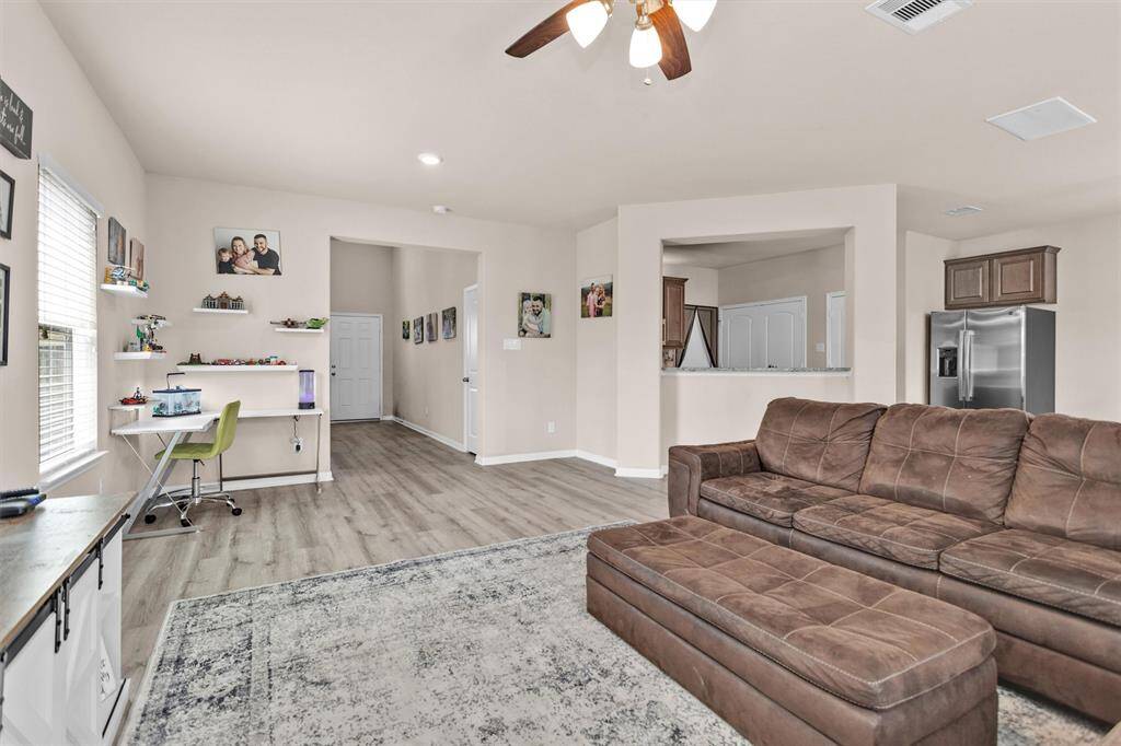 Both entertaining and relaxing are a breeze in the oversized Family Room!