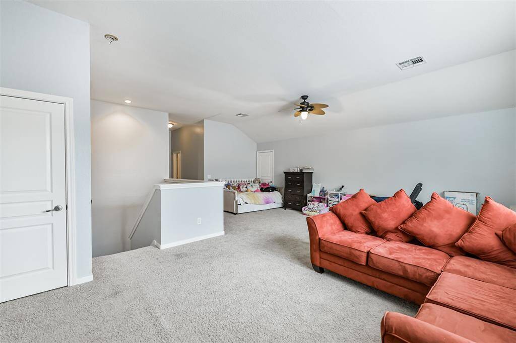 View of upstairs room with area that could be an extra bedroom