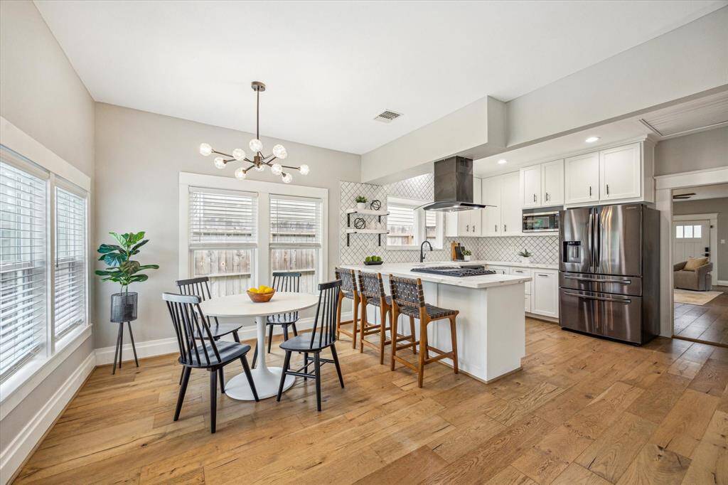 The breakfast area sits just off the kitchen, making everyday meals effortless.