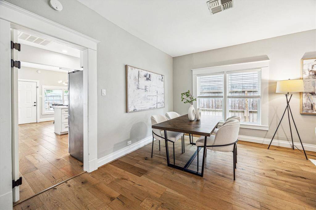 The kitchen’s close proximity to the dining room ensures seamless flow—perfect for entertaining.