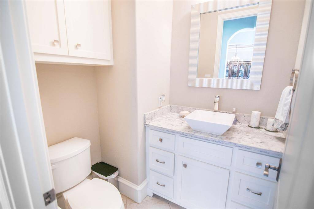 Luxurious en suite bathroom featuring modern fixtures and elegant finishes for ultimate comfort and style.