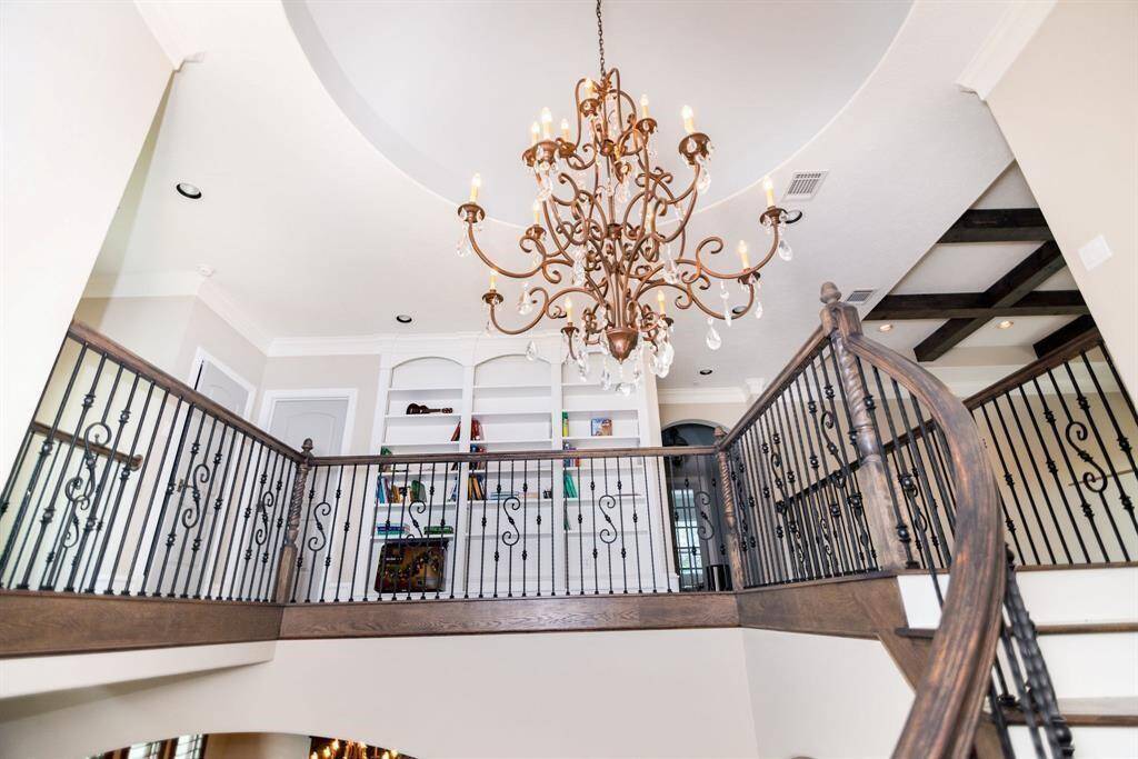 Explore the second floor's elegance, featuring a stunning rotunda and sophisticated architectural details.