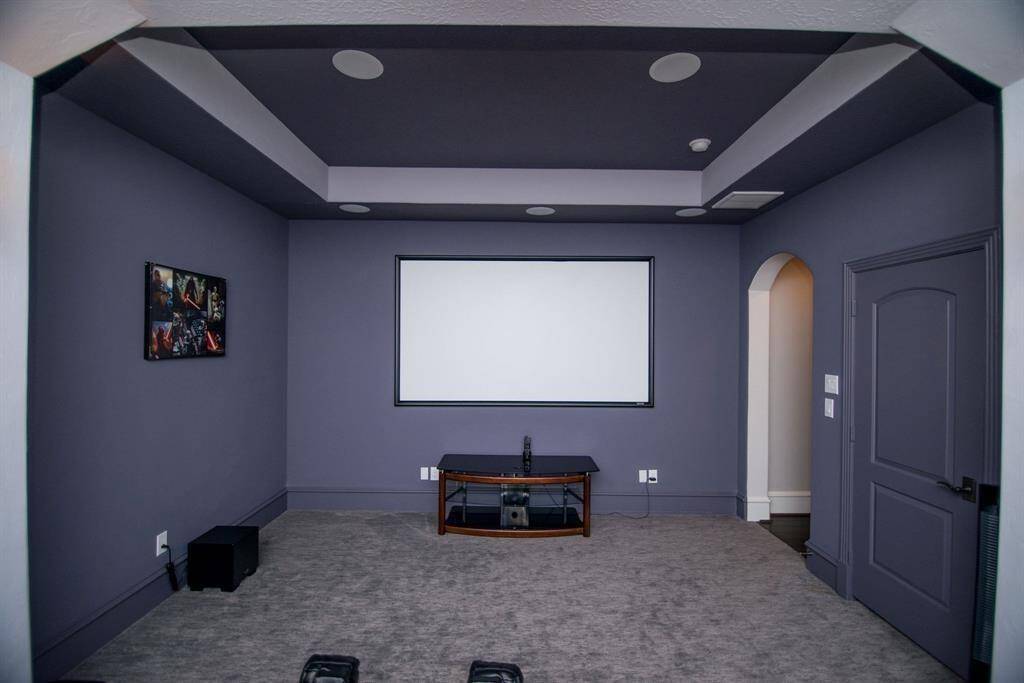 huge screen plush carpeting media room spacious