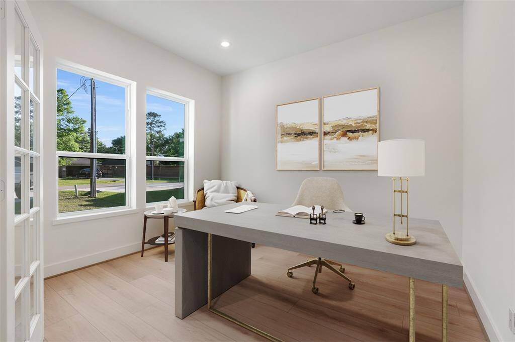 A dedicated study and home office offer flexible spaces for work or relaxation. Virtually staged.
