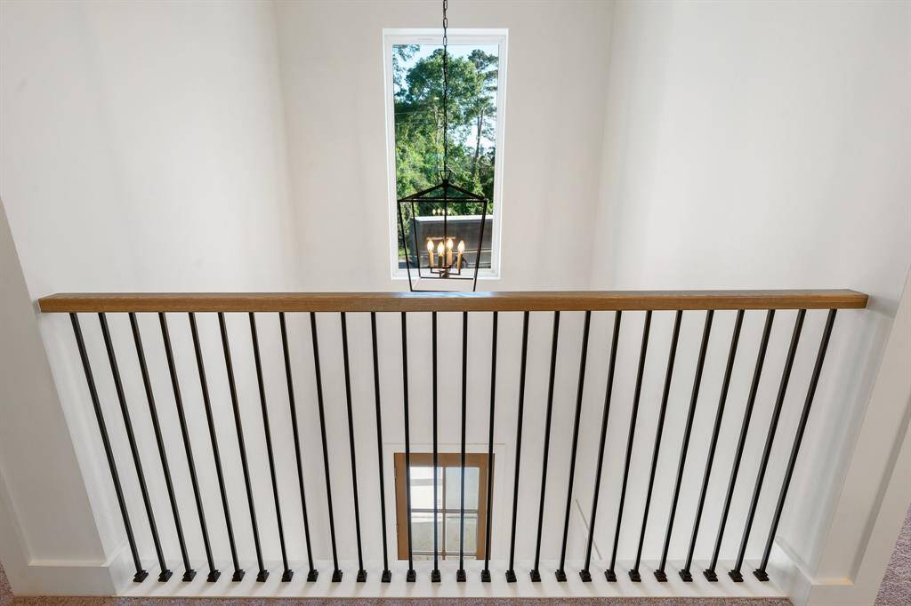 View of the entrance of the home from upstairs.