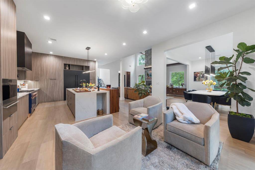 Sitting room or breakfast nook off the kitchen offers an inviting spot for conversation or relaxation.