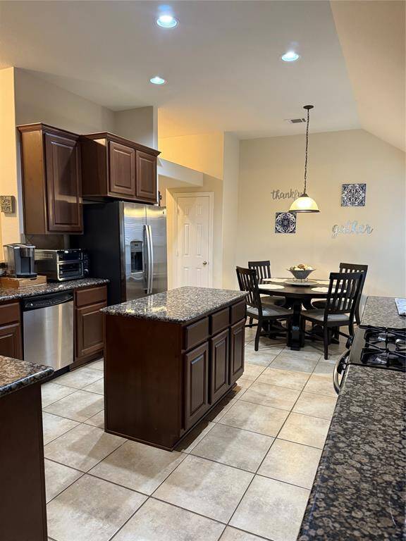 Another view of spacious kitchen - refrigerator included