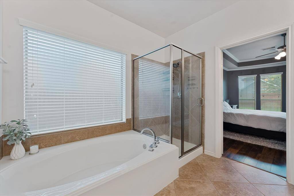 Privacy glass window above he soaking tub