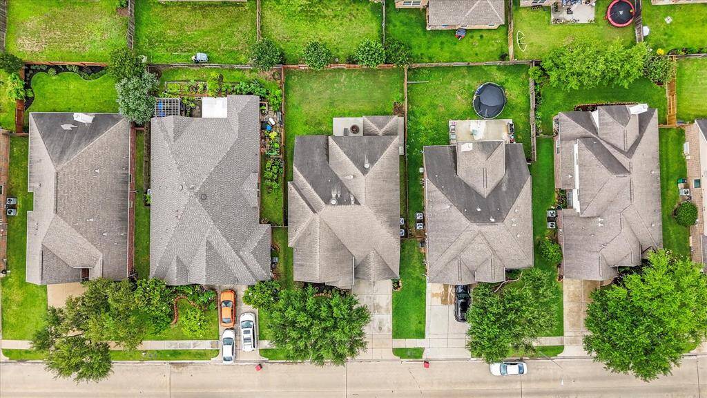 Aerial view of the home nestled on the lot