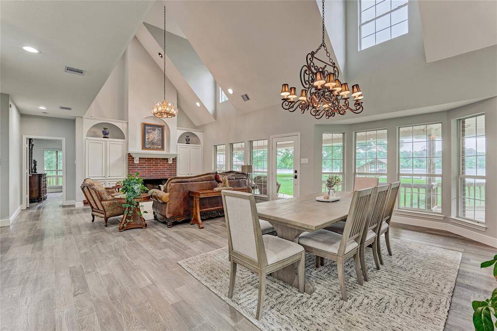 Welcome inside to your lake home with vaulted ceilings and panoramic views, letting in plenty of natural light
