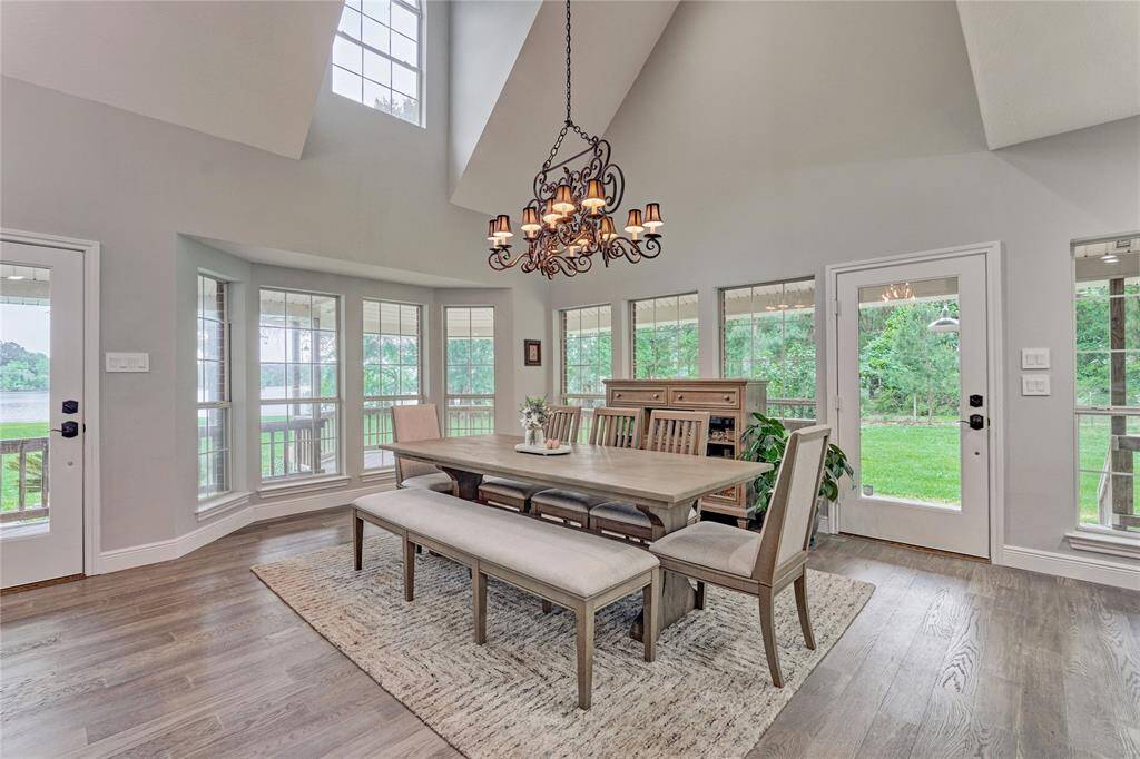Welcome inside to your lake home with vaulted ceilings and panoramic views, letting in plenty of natural light