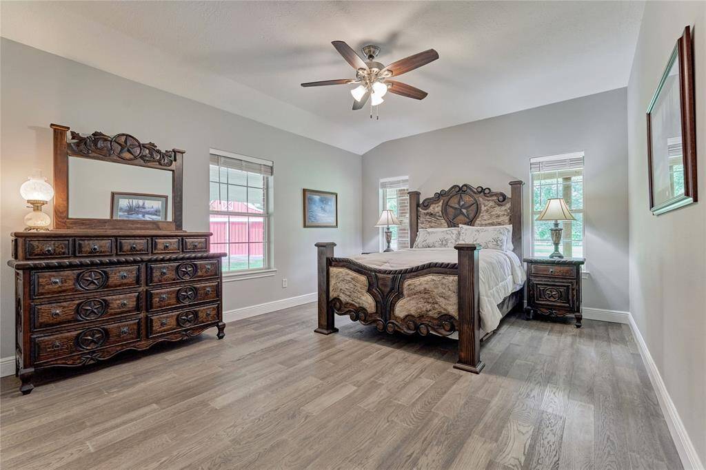 Completely remodeled bathroom with extra-wide tile, quartz counters and peaceful window views