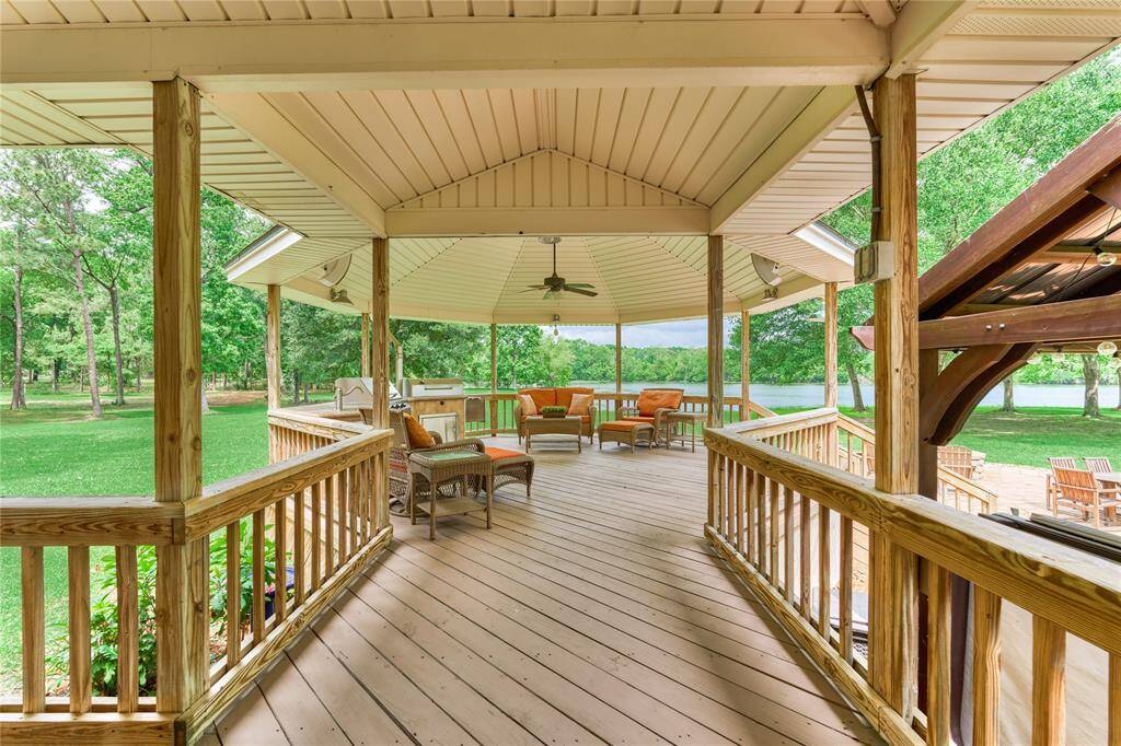 Relax in the shaded outdoor lounge with panoramic lake views