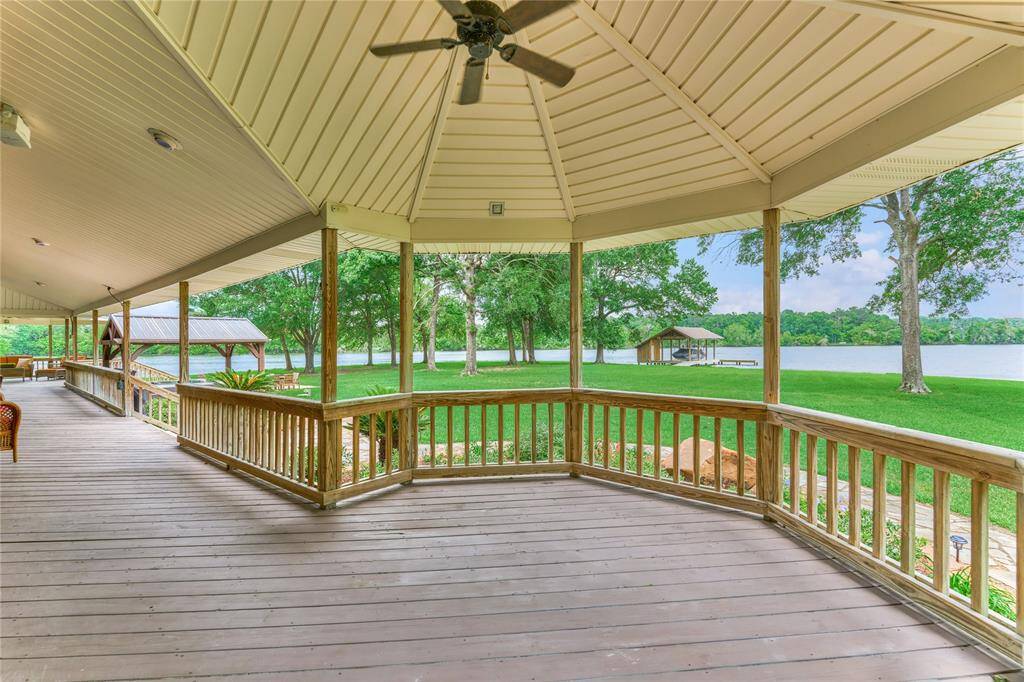 Relax in the shaded outdoor lounge with panoramic lake views