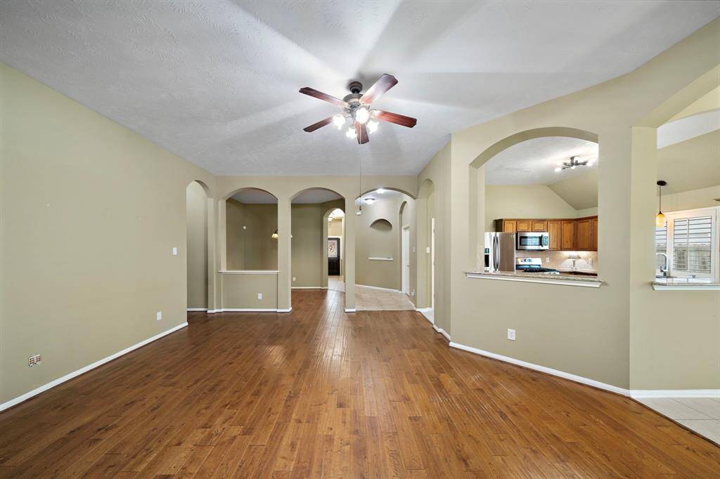 No carpet in this home! Oak wood flooring in the living room, dining room, and primary bedroom.