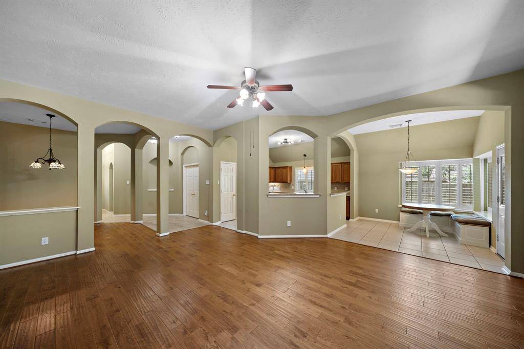 An open floorplan with easy access to the kitchen, breakfast nook, family room, and formal dining room.