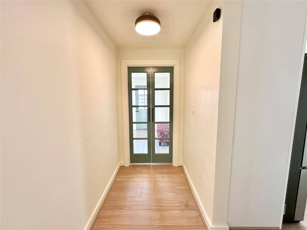 beautiful french doors leading into laundry room.