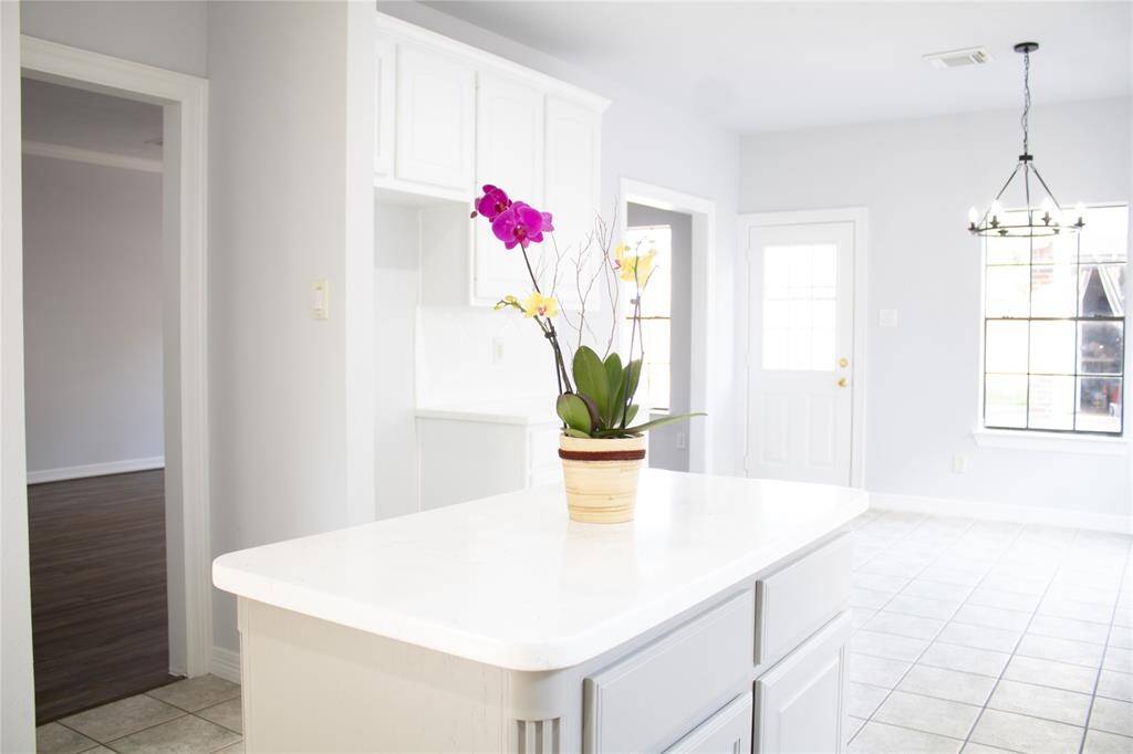 Kitchen is right next to the dining area for ease of entertaining.