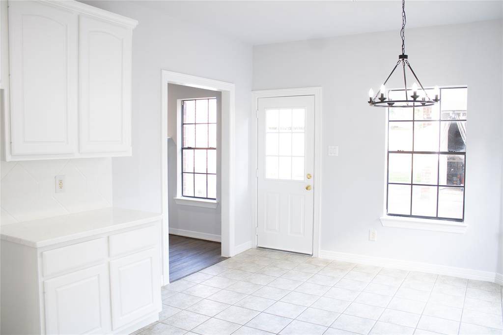 Breakfast area next to kitchen and back door.