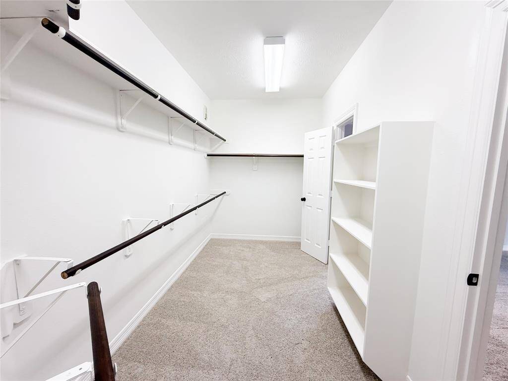 Spacious walk-in closet.