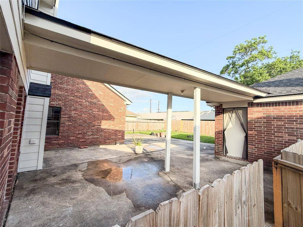 Towards the back of the home there is plenty of outdoor entertainment space for large gatherings.