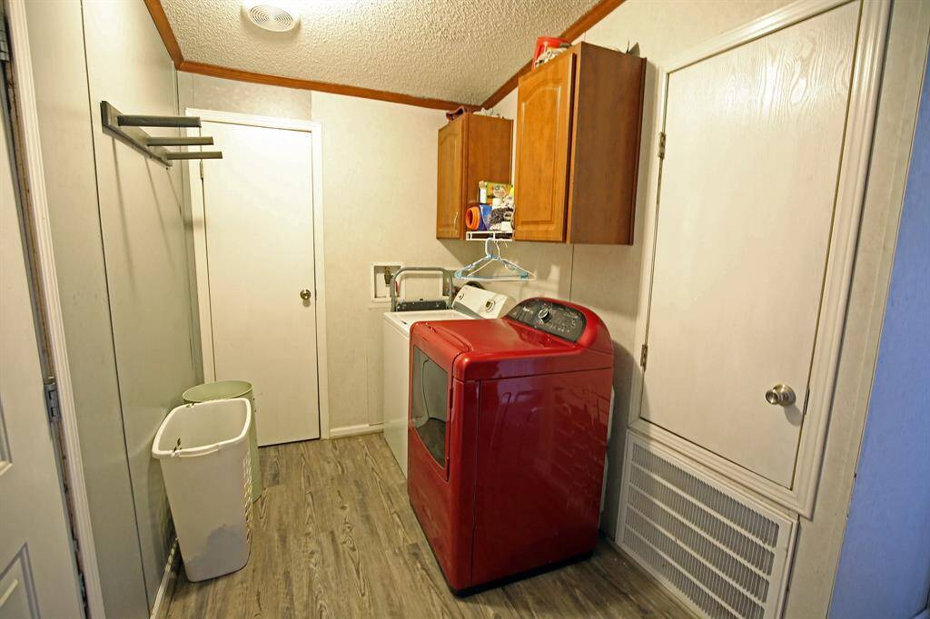 The Side Door comes thru the Utility Room.
