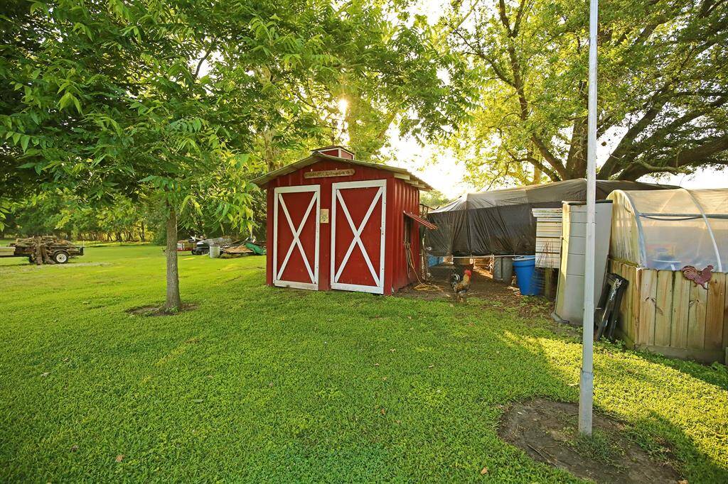 Here is the Green House with a Water Sprinkler System!