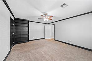 Master Suite with built in bookshelf.